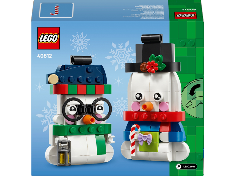 Toy building set featuring two snowmen in a winter theme with accessories.