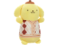Yellow plush toy with a brown hat and a brown and cream argyle sweater.
