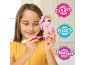 A girl coloring a toy pony with an included felt-tip pen.