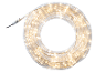 Illuminated LED rope light coiled in a circle on a black background.