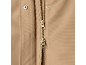 Detail of a beige jacket with a zipper and snap buttons.