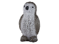 Decorative penguin figure made of clear acrylic with black eyes and beak.