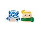Two toy figurines: a blue one with sunglasses and a cream-colored one with a lemon.