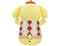 Yellow plush toy with a brown hat and a brown and beige argyle sweater.