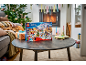 Building blocks advent calendar, gift, and Christmas cards on a table.