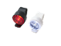 Red and white bicycle lights on a black background.