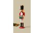 Christmas nutcracker with a 25-day countdown calendar, pine branches, and walnuts.