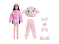 Doll with pink lamb costume and accessories
