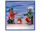Figures in Christmas sweaters: a man, a child, and a helmeted character on a snowy background.