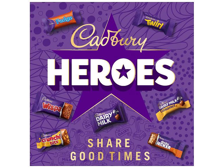 Cadbury Heroes with various chocolates like Fudge, Twirl, Wispa, Dairy Milk, Dairy Milk Caramel, Crunchie Bits, and Dinky Decker, with the text 'SHARE GOOD TIMES'.