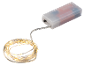 LED string lights with a battery compartment on a black background.