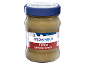 A jar of Greek style whole grain tahini with a blue lid.