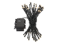Battery-operated LED string lights with timer, bundled, on a black background.