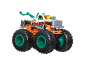 White tow truck with green and orange details, featuring the text 'Ramblin Wrecker'.