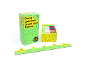 Party game 'Dumb questions to ask your friends' with card box and a scale.