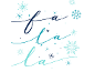 Christmas text 'fa la la' in blue shades with snowflakes.