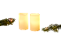 Two LED candles with fir branches and Christmas ornaments.