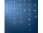 Curtain of white LED lights hanging against a dark blue background.