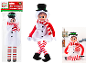 Festive Christmas elf in a snowman costume with a hat and scarf.
