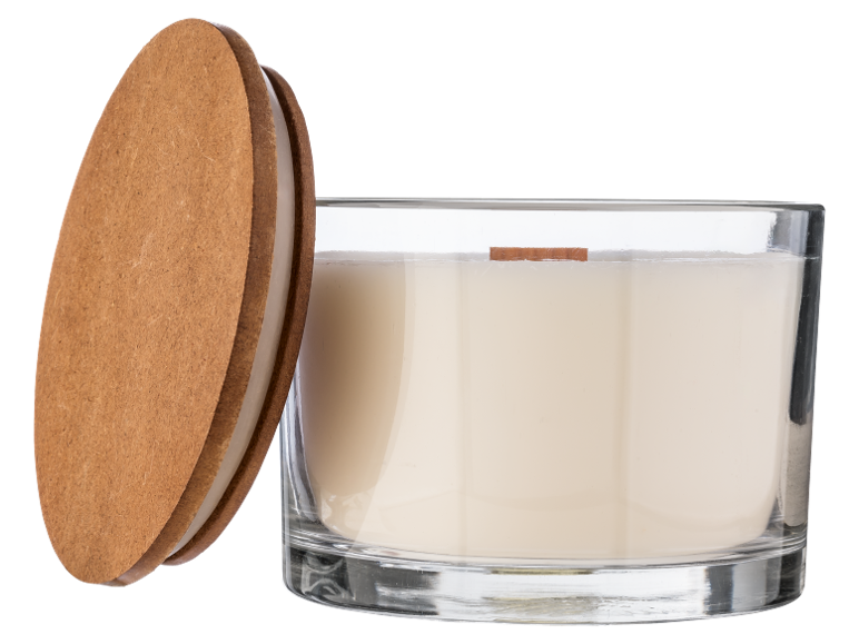 A glass candle with a wooden wick and a round wooden lid, on a black background.