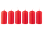 Six red pillar candles with white wicks on a black background.