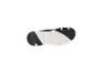 Black and white sports shoe sole with a traction pattern.