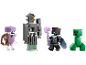 Four block-style toy figures, including a skeleton, a golem, a wizard, and a green monster.