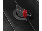 Black angle ruler with a red adjustment knob on a textured surface.