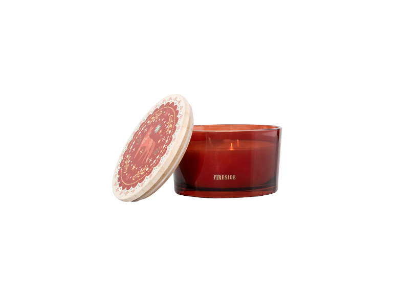 Fireside scented candle in a red glass jar with a decorated wooden lid