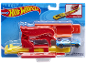 Hot Wheels car launcher and blue toy car in packaging with text 'RACE ANYWHERE!'