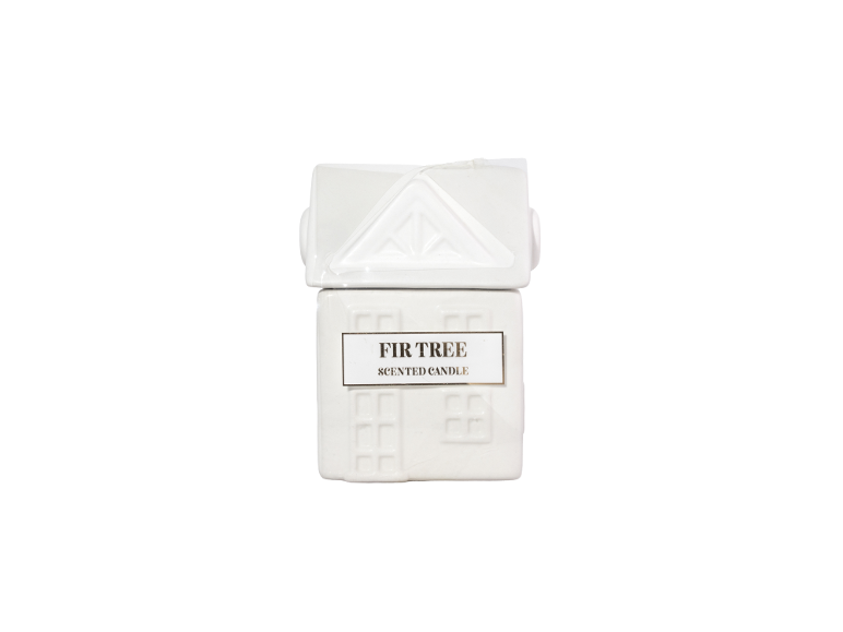 White house-shaped scented candle with fir tree fragrance