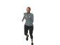 Woman in a gray sports top and black leggings running on a white background.