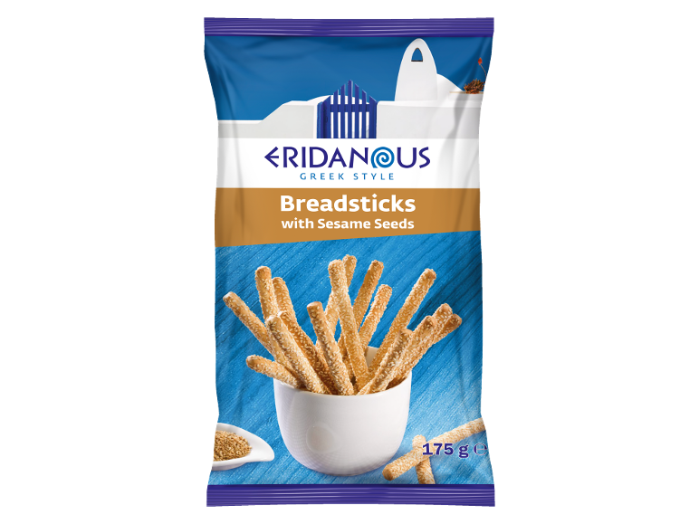 Greek style breadsticks with sesame seeds in a white cup, on a blue background, with a Greek motif.