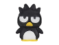 Black penguin figurine with a yellow beak and a grumpy expression.