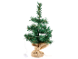 Green artificial Christmas tree with lights and a burlap sack base