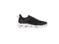 Black sports shoes with pink details and a white sole with cut-out design.