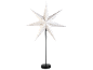 Decorative white Christmas star with a black stand.