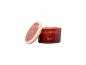 Fireside scented candle in a red glass jar with a decorated wooden lid