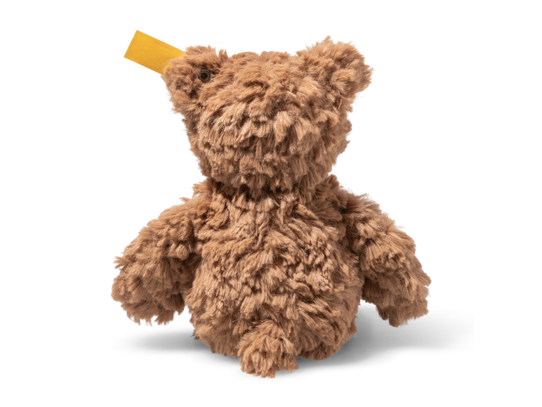 Soft brown teddy bear seen from behind.