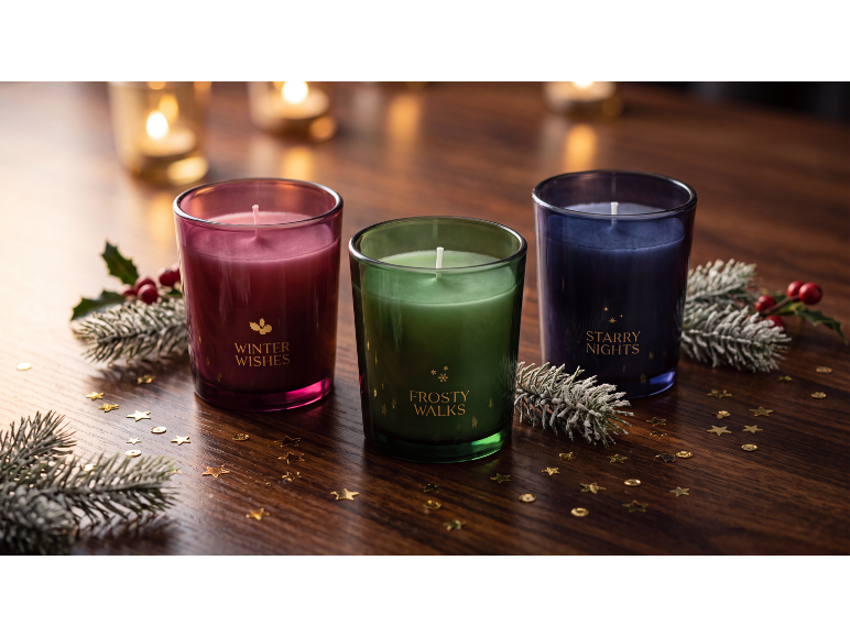 Three festive scented candles: Winter Wishes, Frosty Walks, and Starry Nights.