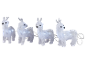 Four illuminated white reindeer figures, connected by a clear wire, for festive decoration.
