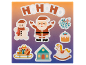 Christmas stickers featuring 'HO HO HO', Santa Claus, a snowman, sleigh, house, rocking horse, and mistletoe.