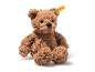 Brown plush teddy bear sitting on a white background.