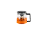 Glass teapot with a black handle and lid, filled with tea.