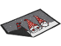 Christmas doormat with three gnomes, one with 'MERRY CHRISTMAS' text and one with 'JOY'.