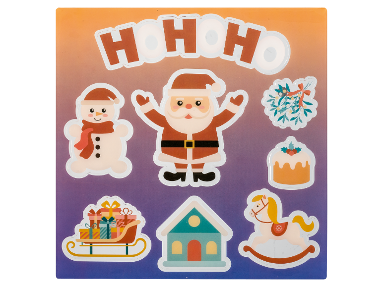 Christmas stickers featuring 'HO HO HO', Santa Claus, a snowman, sleigh, house, rocking horse, and mistletoe.
