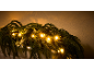 Christmas garland with warm white LED lights on a light background.
