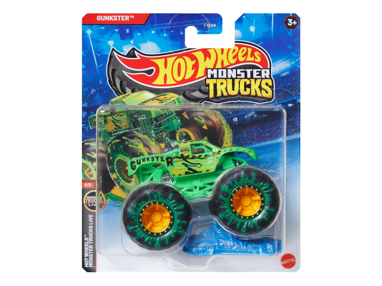 Green monster truck toy with large wheels in packaging, with a blue background.
