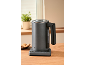 Anthracite grey electric kettle with temperature control on a wooden table.