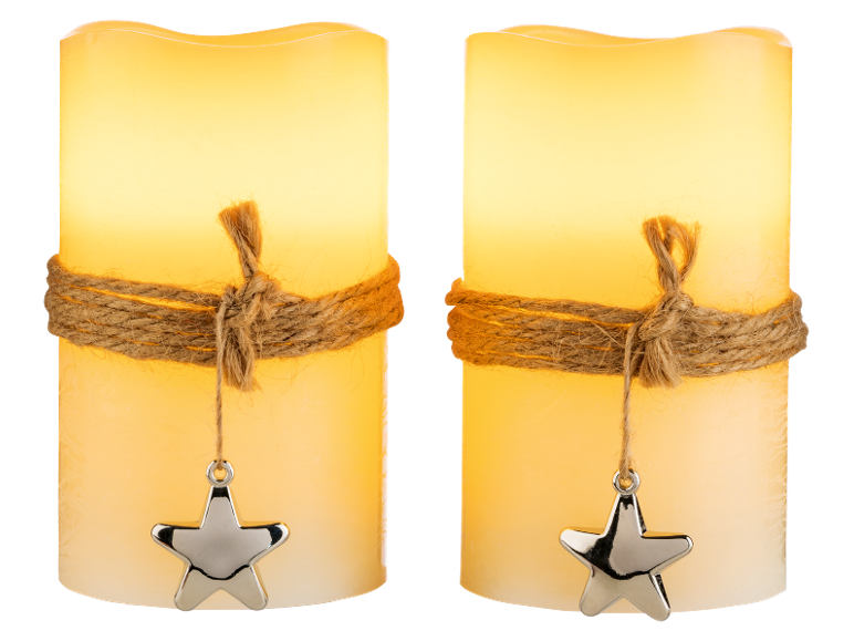 Two decorative LED candles with jute rope and star pendant.